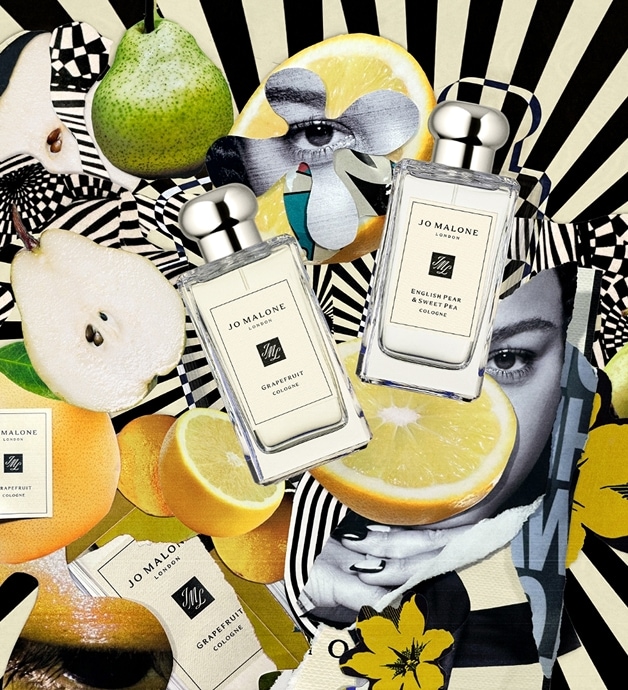 Jo Malone London bottles with citrus fruits and florals on a dynamic black-and-white spiral.