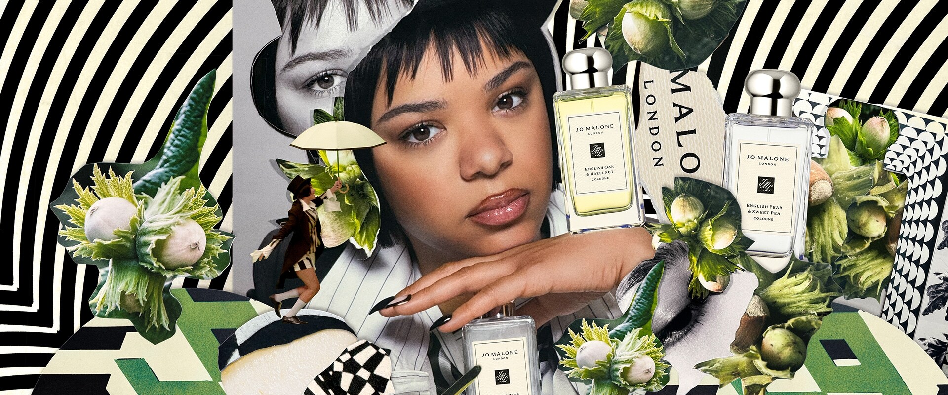 Person with Jo Malone London bottles, pears, and flowers on a black-and-white striped background.
